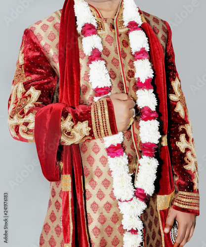 Indian groom wearing wedding sharwani dress