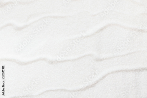 Fotografi Wavy pattern on white sugar background, copy space