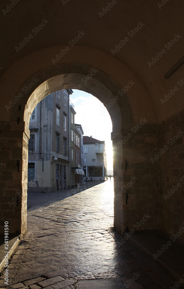 Gate of the Sea (Saint Chrysogonus' Gate) Zadar in ZADAR / CROATIA. Entrance to the city.  On top of this town gate one sees Saint Chrysogonus on a horse. This saint is the city saint of Zadar. 