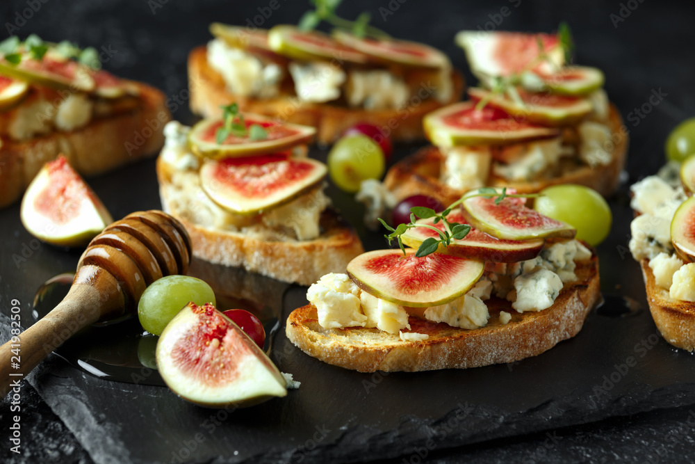 This Fig and Gorgonzola tartines, toast, bruschetta. drizzled with honey. This Fig and Gorgonzola tartines, toast, bruschetta. drizzled with honey.