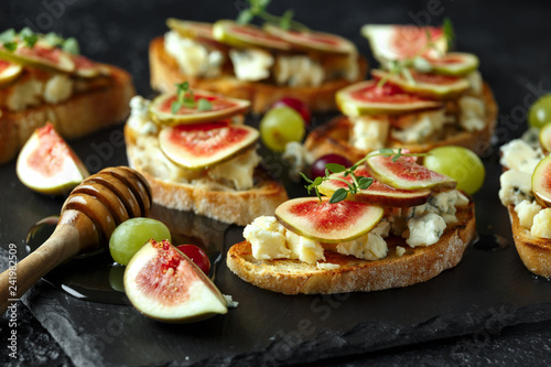 This Fig and Gorgonzola tartines, toast, bruschetta. drizzled with honey.