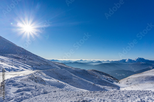 Winter landscape in a sunny day on the snow covered Velouchi mountain in Greece