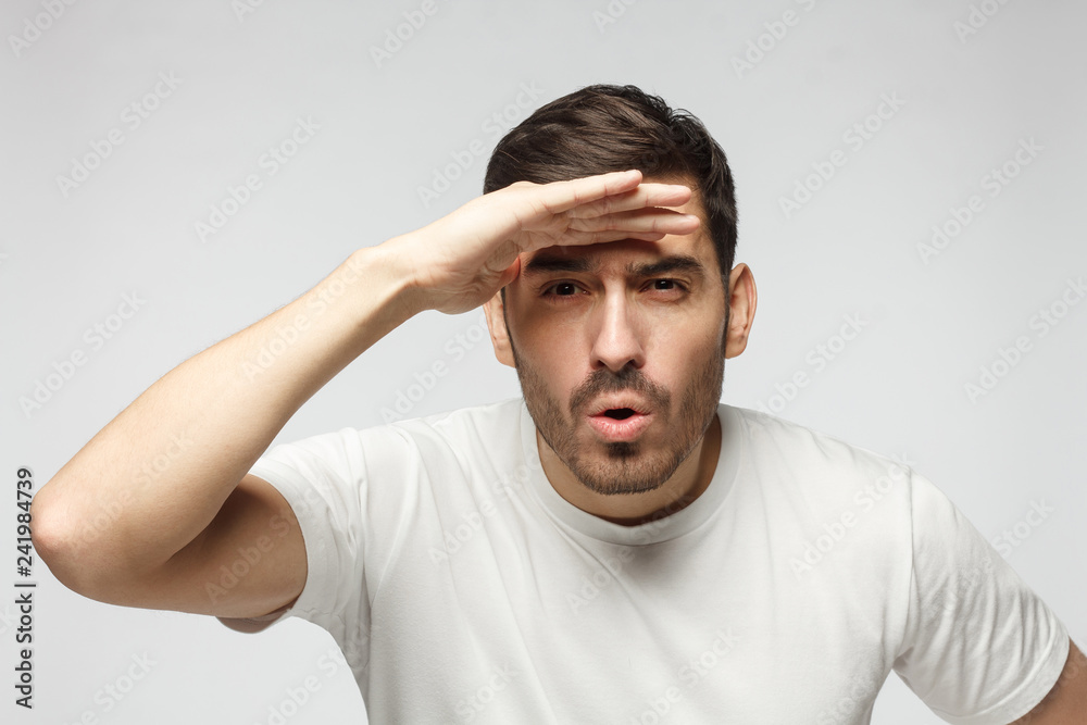 Picture of guy looking far away as if looking for some place or great perpectives for business Picture of guy looking far away as if looking for some place or great perpectives for business