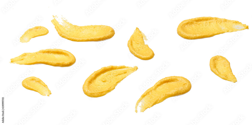 Splashes and stains mustard sauce isolated on white background. Splashes and stains mustard sauce isolated on white background.
