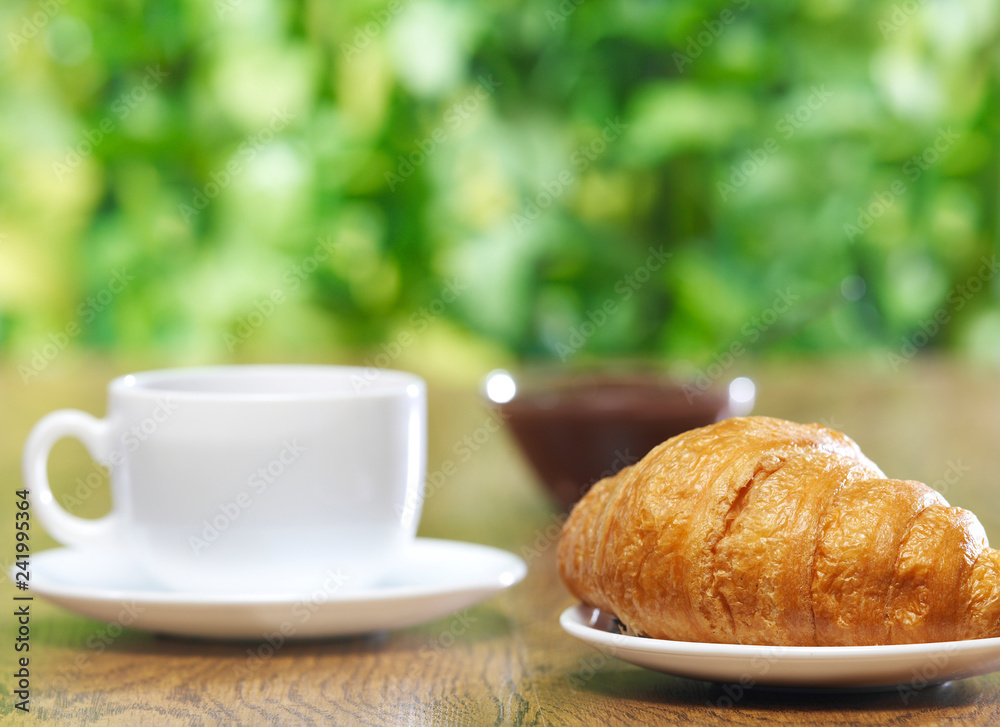 Croissant and coffee Croissant and coffee