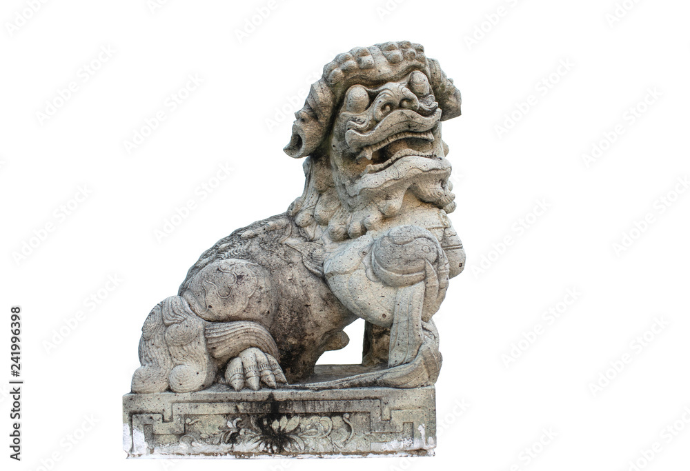 Isolated image of Carving stone lion in Chinese style is popular used to show around Buddhism temple in Thailand and Southeast Asia countries.