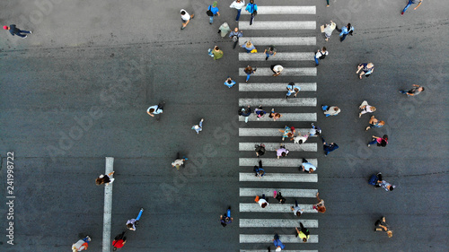 Fotografie, Obraz Aerial. Pedestrian crossing crosswalk and crowd of peolple.
