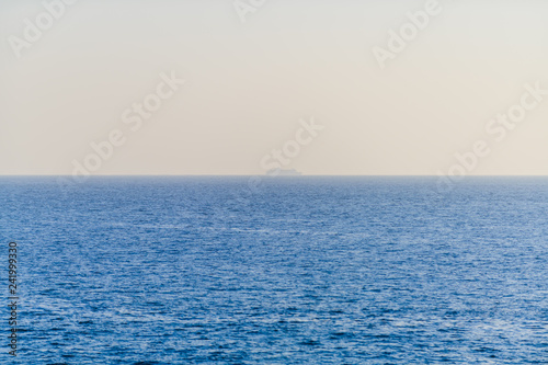 Ocean, sky and lonely ship. Creative sketches. Tenerife. Canary Islands..Spain