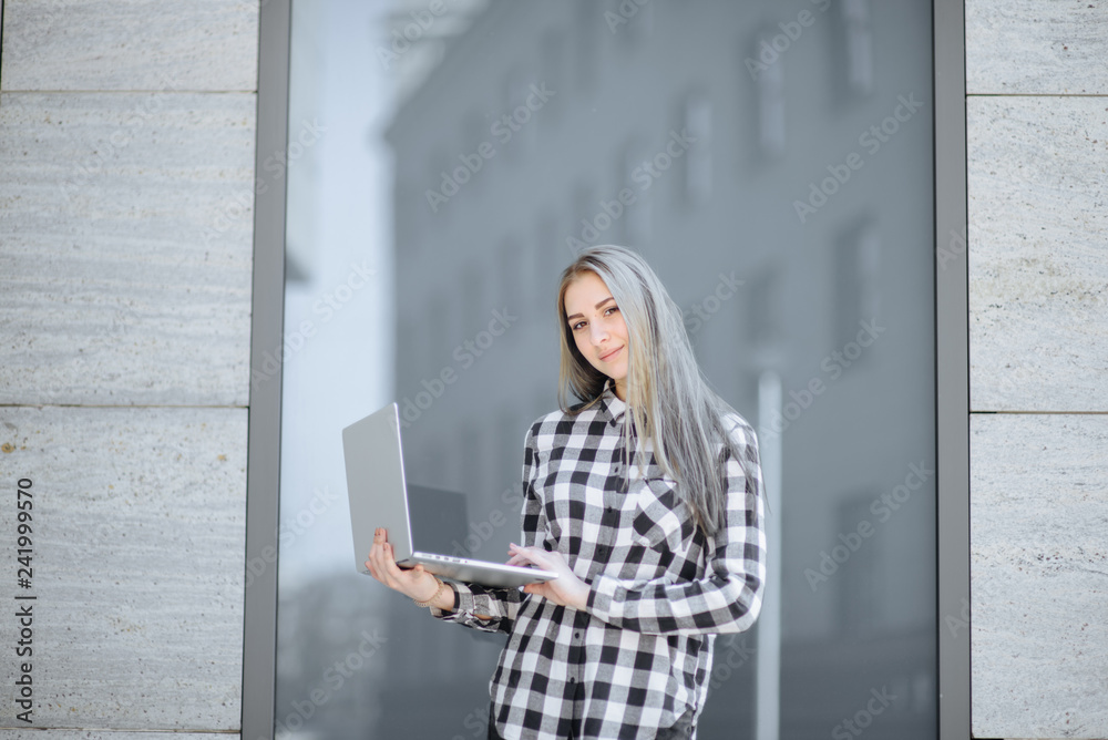 Enjoying time. Female person and front open laptop computer with empty space for your information or content, modern freelancer hipster businesswoman work in internet, student time Enjoying time. Female person and front open laptop computer with empty space for your information or content, modern freelancer hipster businesswoman work in internet, student time