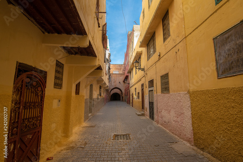 View of Meknes medina , Morocco. Meknes is a city listed as a UNESCO world heritage site. a city which was founded in the 11th century by the Almoravids. no people street  photo