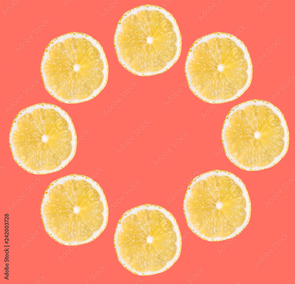 Background of fresh yellow lemon slices. Circle fruit frame Close up. Background of fresh yellow lemon slices. Circle fruit frame Close up.