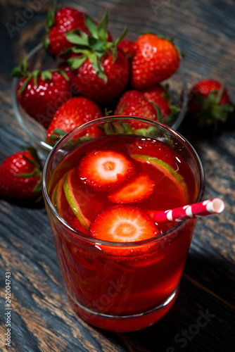Wallpaper Mural strawberry citrus lemonade on a dark background, top view vertical Torontodigital.ca