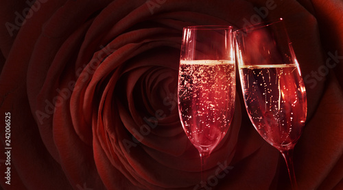 Red rose with champagne photo