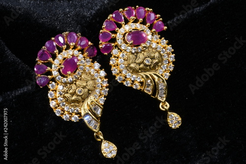 Imitation jewelry - Modern fancy earrings closeup macro image for woman fashion 