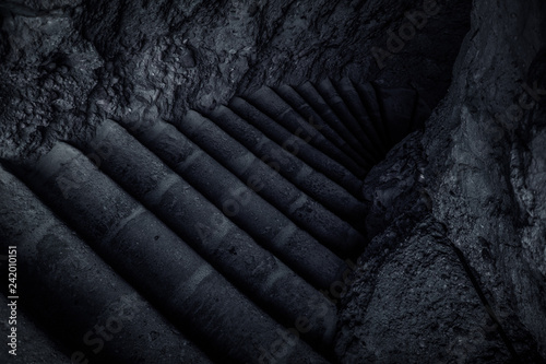 Принти на полотні mystic stairs in twilight shadow inside stone medieval prison dungeon