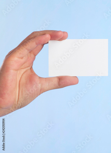 Hand showing the business card