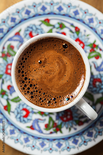 Black coffee in traditional Turkish cup