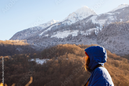 Girl on a mountain background