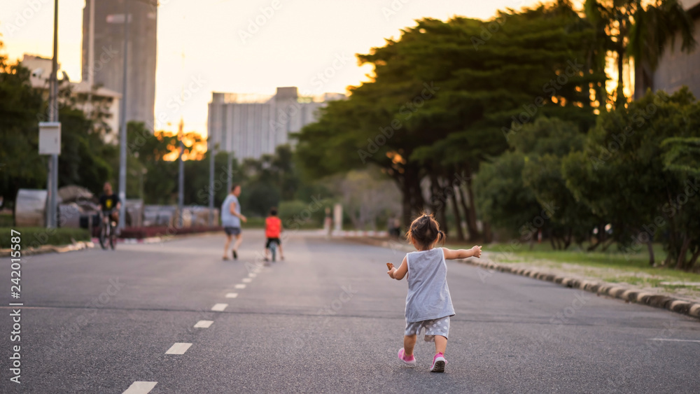 daughter run following mom and brother