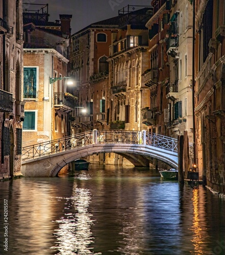 Italy beauty, typical night bridge over canal street in Venice, Venezia