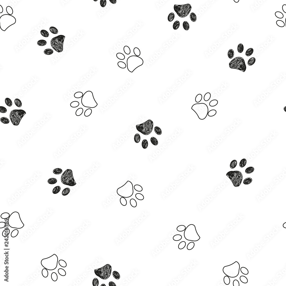 Fototapeta premium Black and white paw print repeated pattern