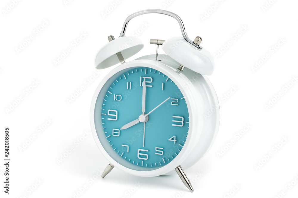 Twin bells analogue alarm clock with turquoise clock face shows eight o’clock, 8 AM PM; concept on white background Twin bells analogue alarm clock with turquoise clock face shows eight o’clock, 8 AM PM; concept on white background