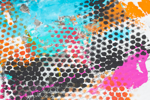 Digital created grunge background painting in bright colors of pink, turquoise, orange and black