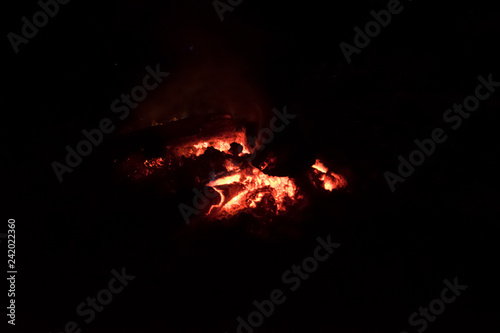 close up detail of camp fire , bonfire burning in dark