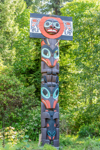Totem poles amongst the trees in Stanley Park Vancouver