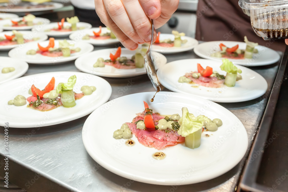 Making of posh antipasti with fish carpaccio Making of posh antipasti with fish carpaccio