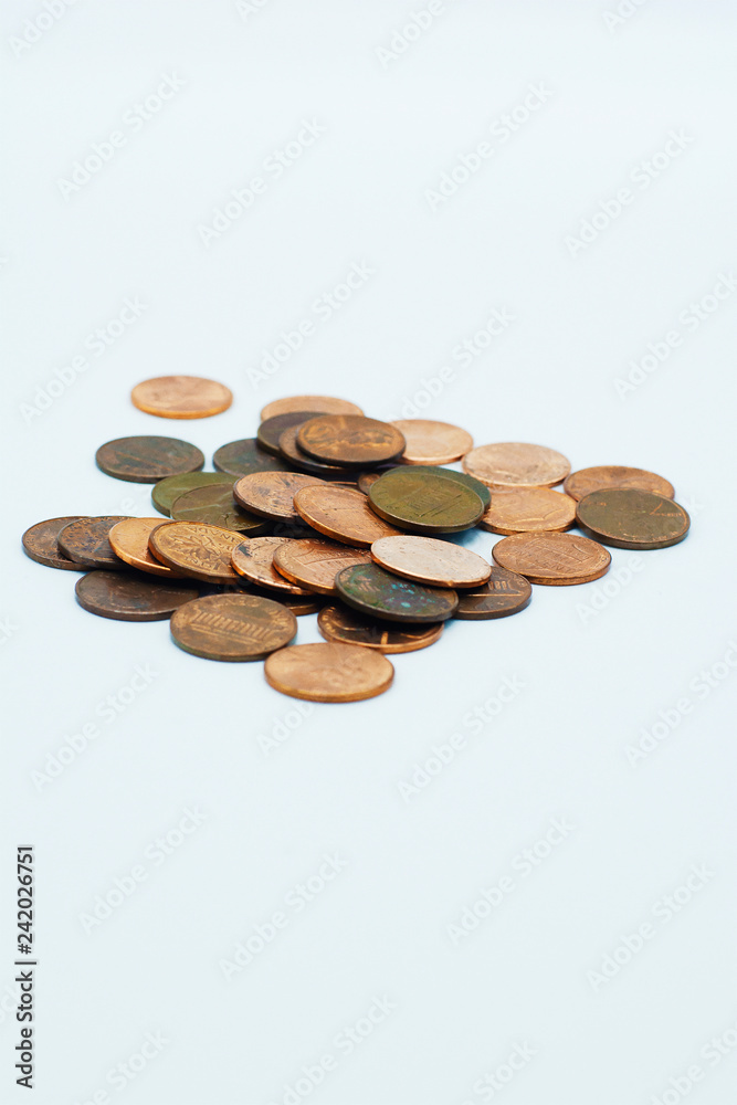 A pile of pennies on an isolated white background. A pile of pennies on an isolated white background.