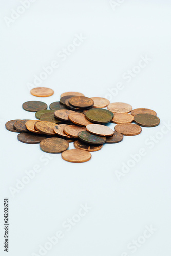 A pile of pennies on an isolated white background.