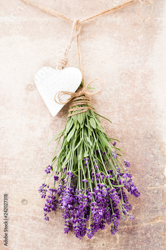 Fototapeta Naklejka Na Ścianę i Meble -  Lavender flowers, bouquet on rustic background, overhead.