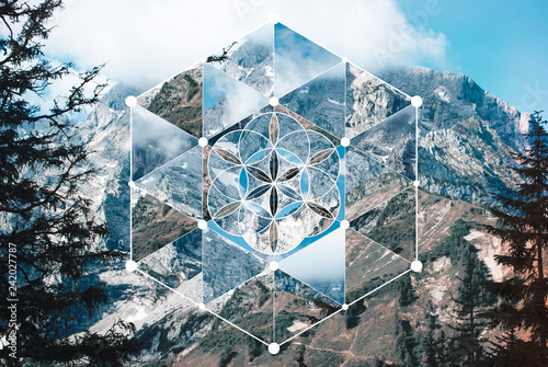 Collage with the mountain landscape and the sacred geometry symbol photo