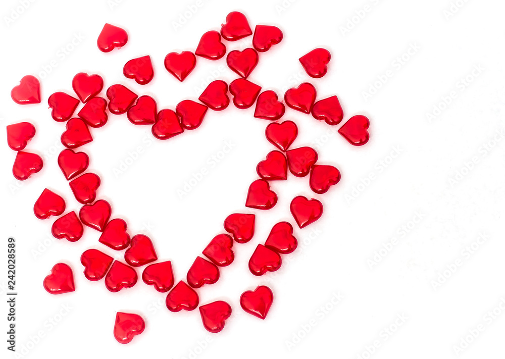 Valentine's day scattered red hearts on white background