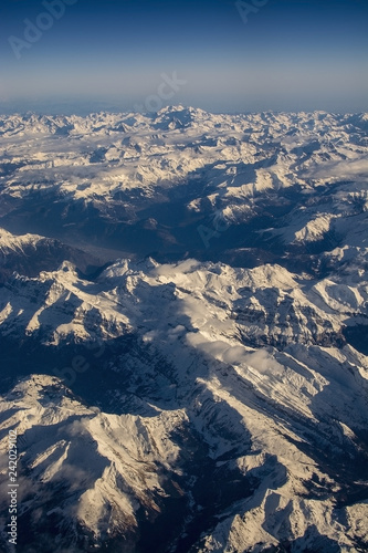Swiss Alpes with snowy mountain tops aerial