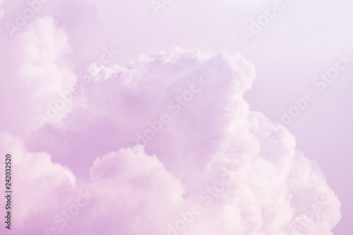 Light pink fluffy clouds as background (abstract, copy space)