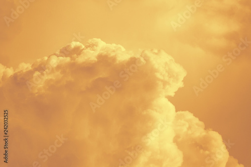Orange fluffy clouds as background (abstract)