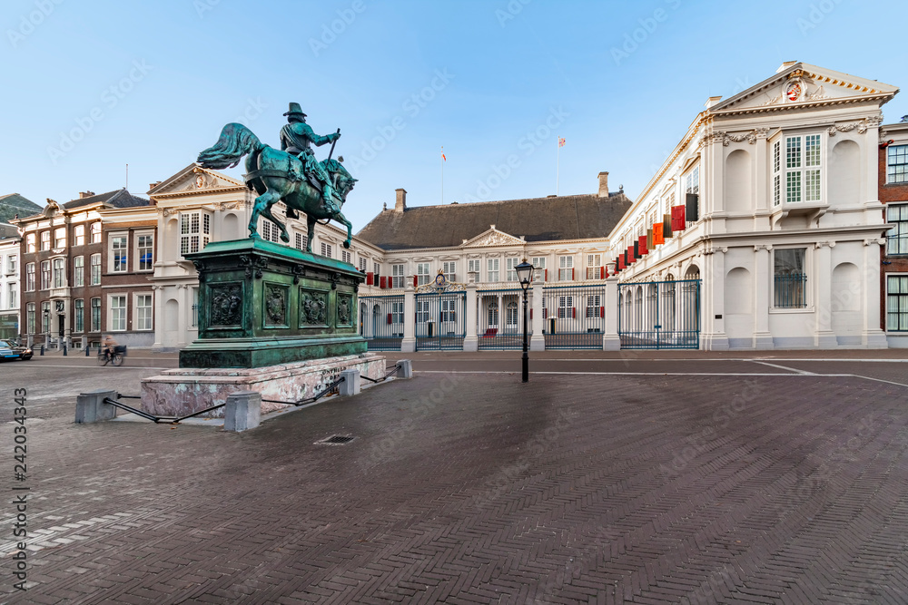 One of the official working place for the Dutch King, Willem-Alexander of Orange in The Hague with the statue Willem van Oranje, the leader of the revolt against Spain