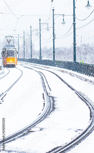 Traditional yellow tram in ...