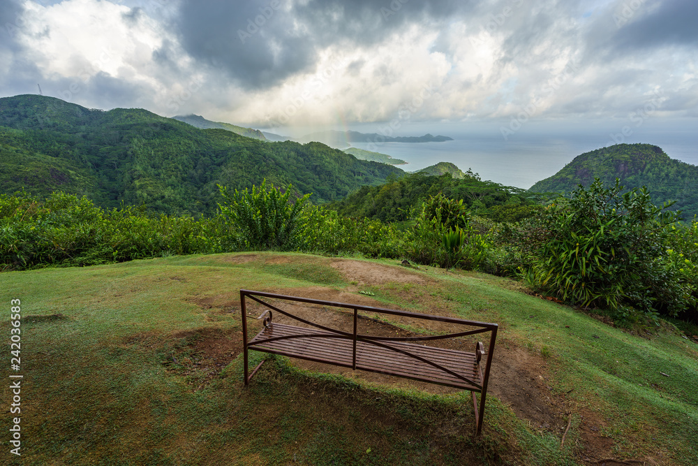 rainbow and rain over the jungle and mountains of mahé, seychelles 1 rainbow and rain over the jungle and mountains of mahé, seychelles 1