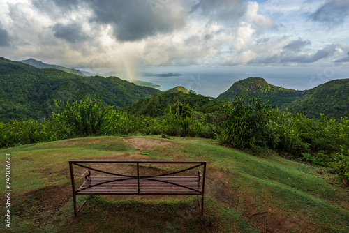 rainbow and rain over the jungle and mountains of mahé, seychelles 6