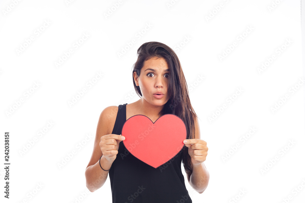 beautiful happy young woman who is holding a big red heart for valentine's day beautiful happy young woman who is holding a big red heart for valentine's day