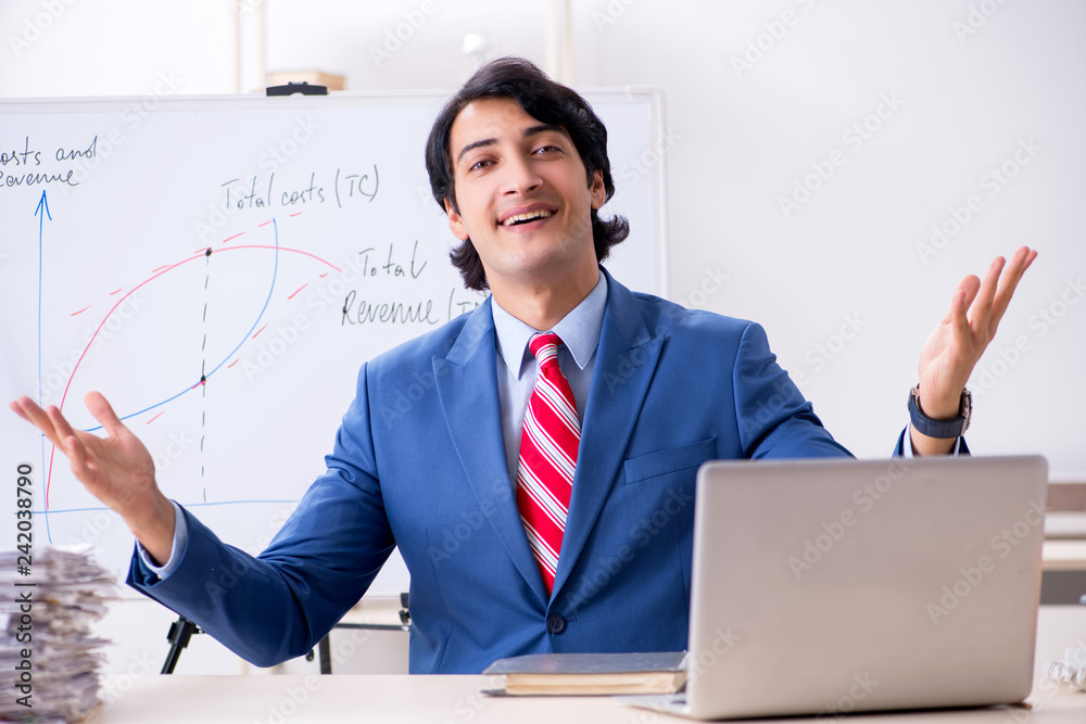 Busy businessman explaining business charts Busy businessman explaining business charts