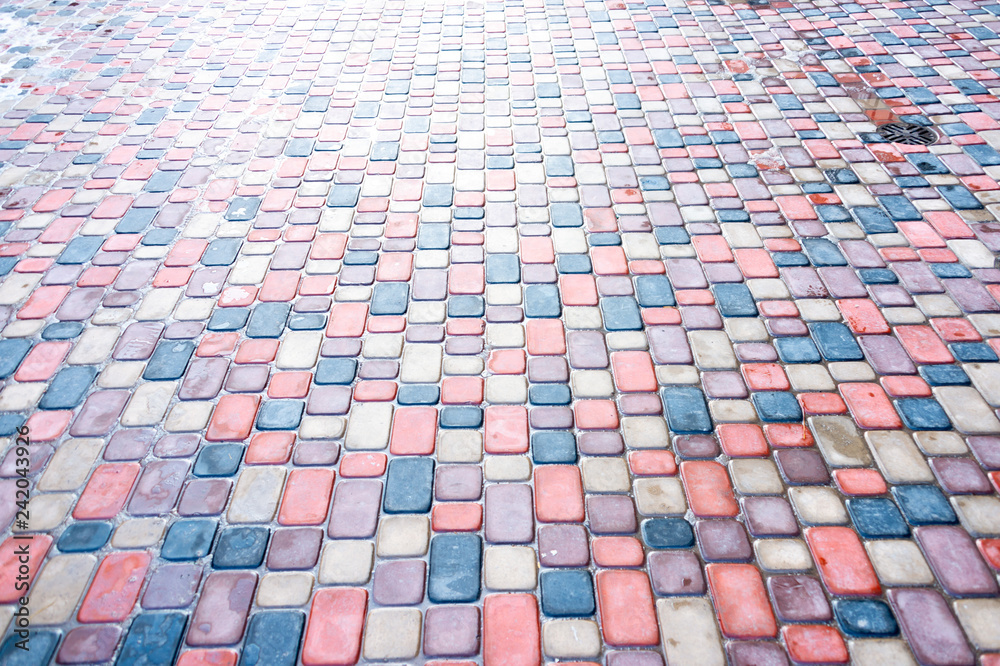 Fototapeta premium Abstract colorful background of sidewalk tiles - Sidewalk tile as a background for advertising