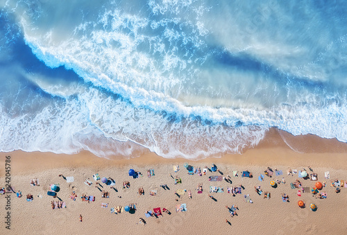 Aerial view at the beach. Turquoise water background from top view. Summer seascape from air. Top view from drone. Travel concept and idea