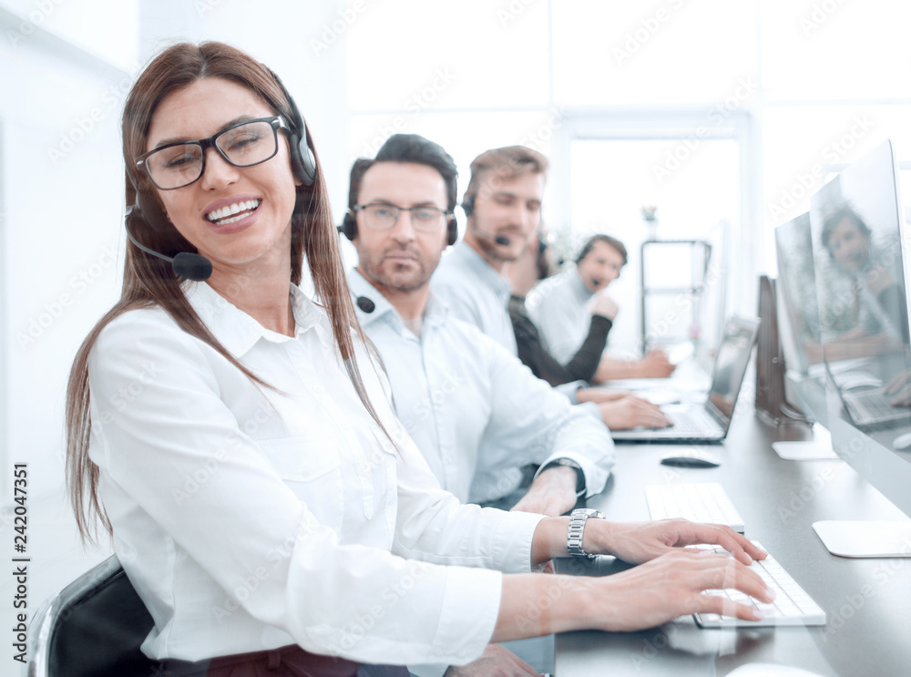 woman operator in the workplace at the call center woman operator in the workplace at the call center