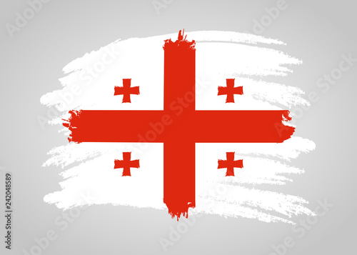 Georgia Flag. Brush painted Georgia Flag. Hand drawn style illustration with a grunge effect and watercolor. Georgia Flag with grunge texture. Vector illustration.