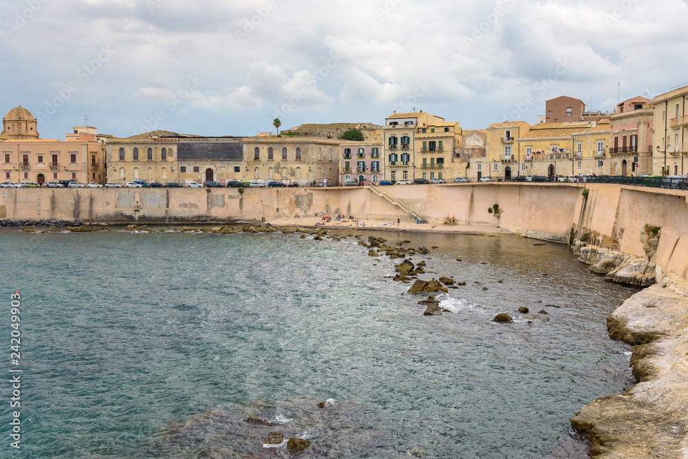 Waterfront of Ortygia Island with small pebble beach