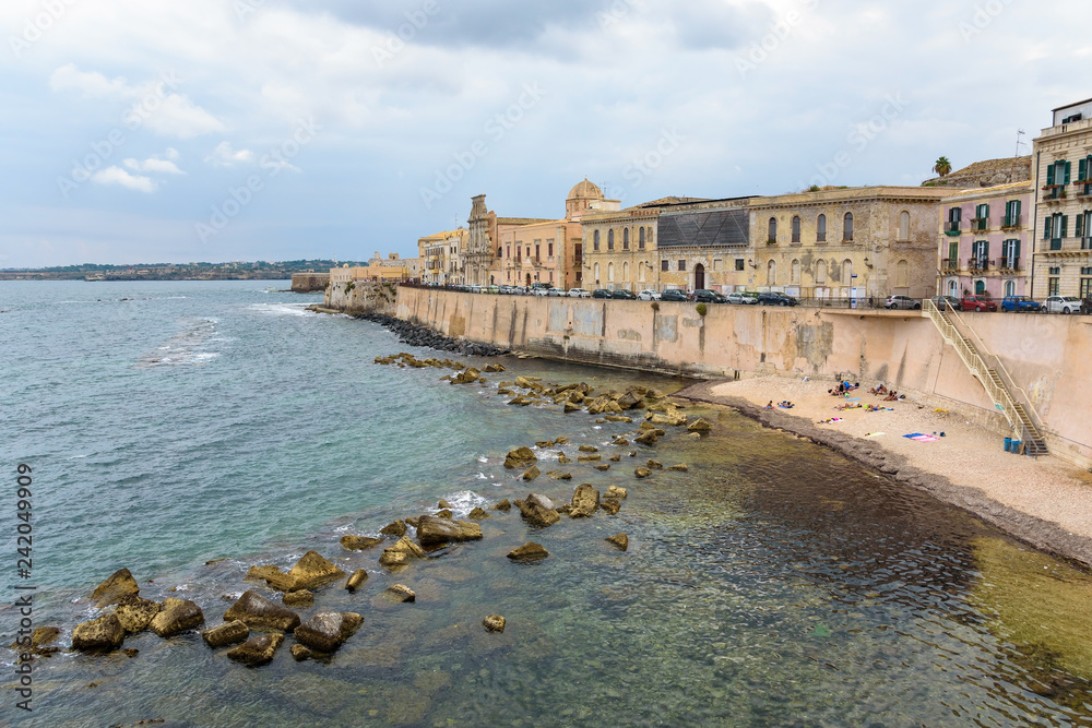 Waterfront of Ortygia Island with small pebble beach